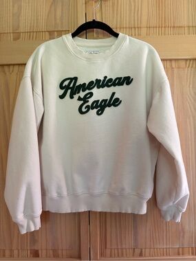 American Eagle Outfitters Cream Crewneck Sweatshirt with Green Script